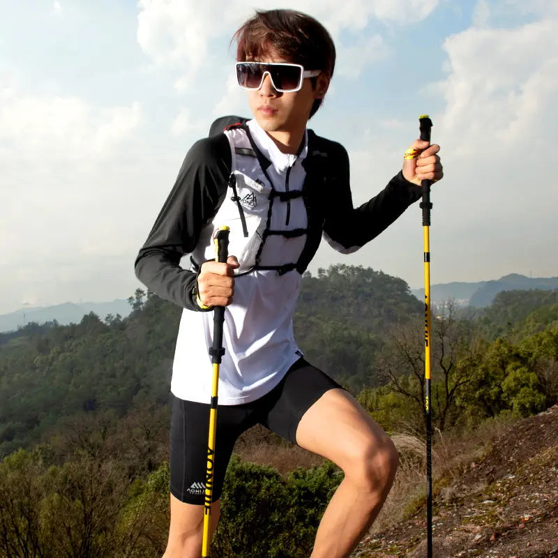 Bastones de Trekking y Trail Running Aonijie (1 par)- Full Carbono - Plegables - Cuatro tramos + ¡ENVÍO 🚚 GRATIS!
